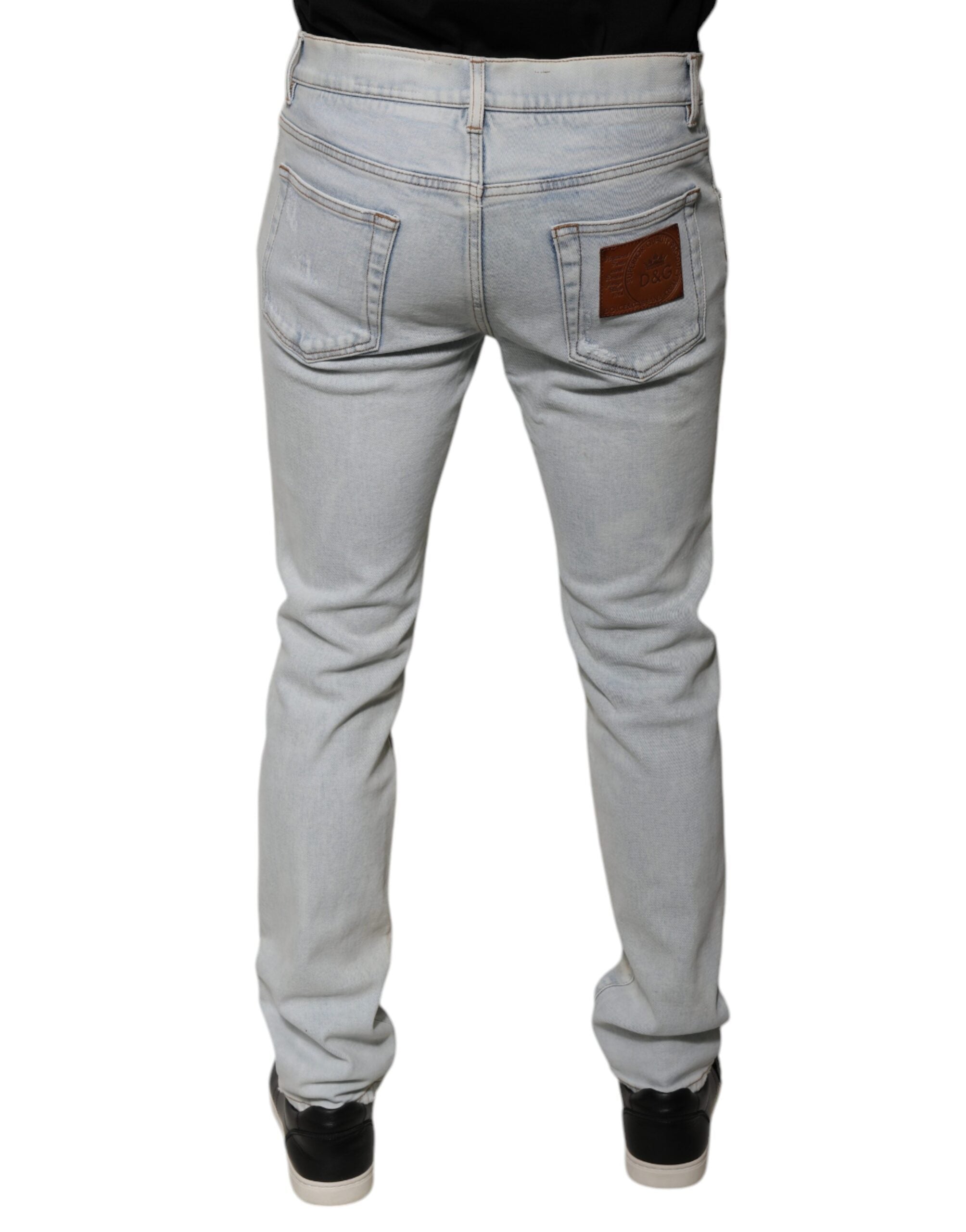 Dolce & Gabbana Hellblaue zerfledderte Skinny Denim Jeans aus Baumwollmischung