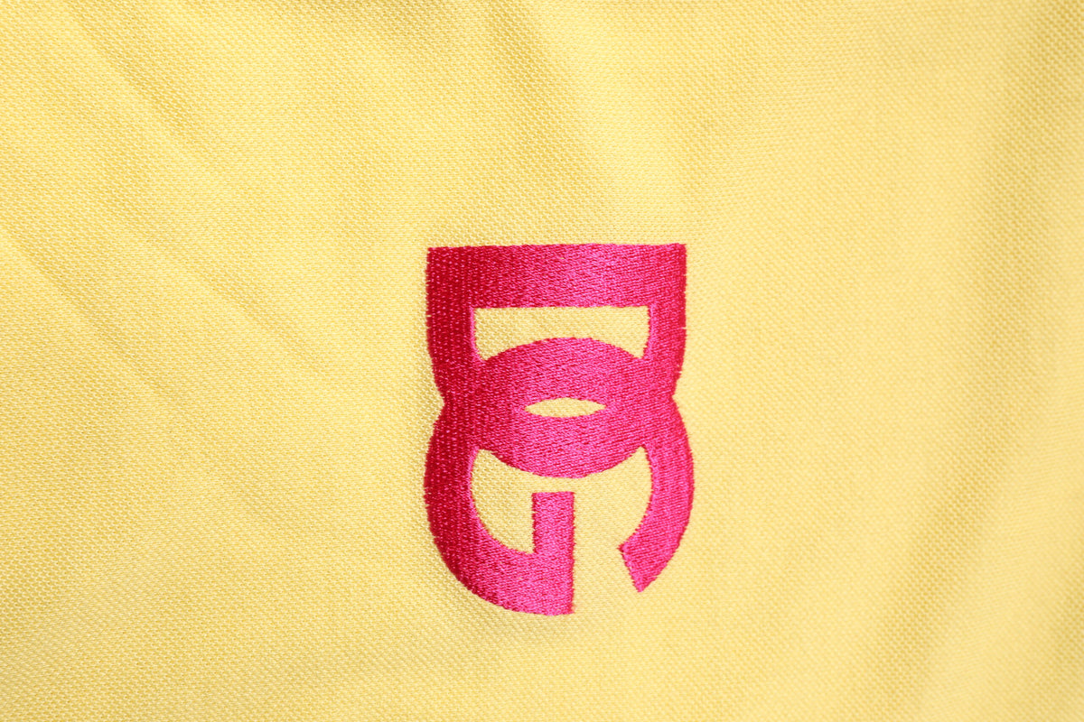 Dolce & Gabbana Gelbes Logo-Polo-T-Shirt aus Baumwolle mit Kragen