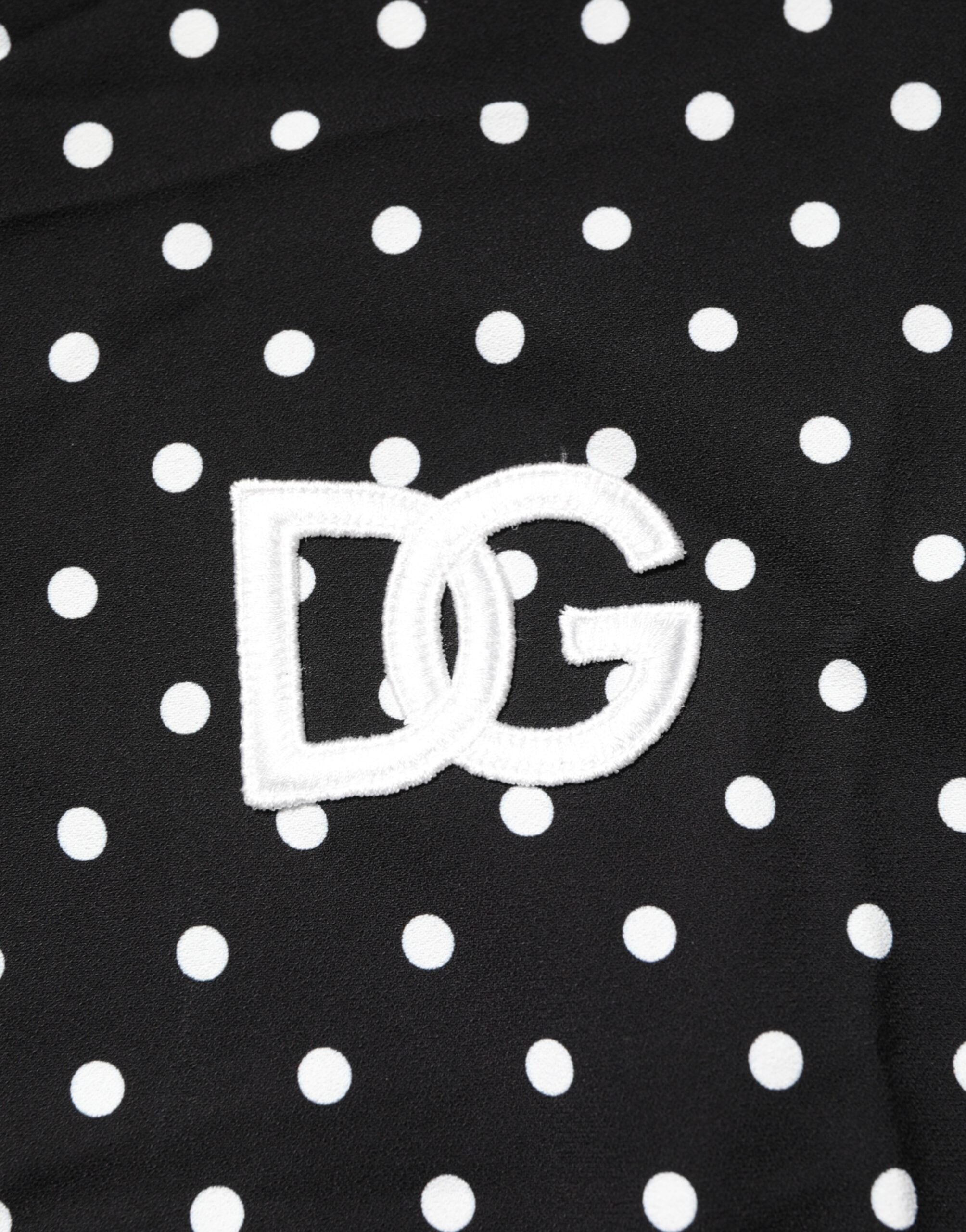 Dolce & Gabbana Schwarzes gepunktetes Polo-T-Shirt mit kurzen Ärmeln und Kragen