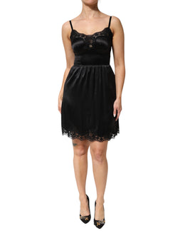 Dolce & Gabbana Schwarzes ärmelloses Minikleid mit Spitzenbesatz aus einer Seidenmischung