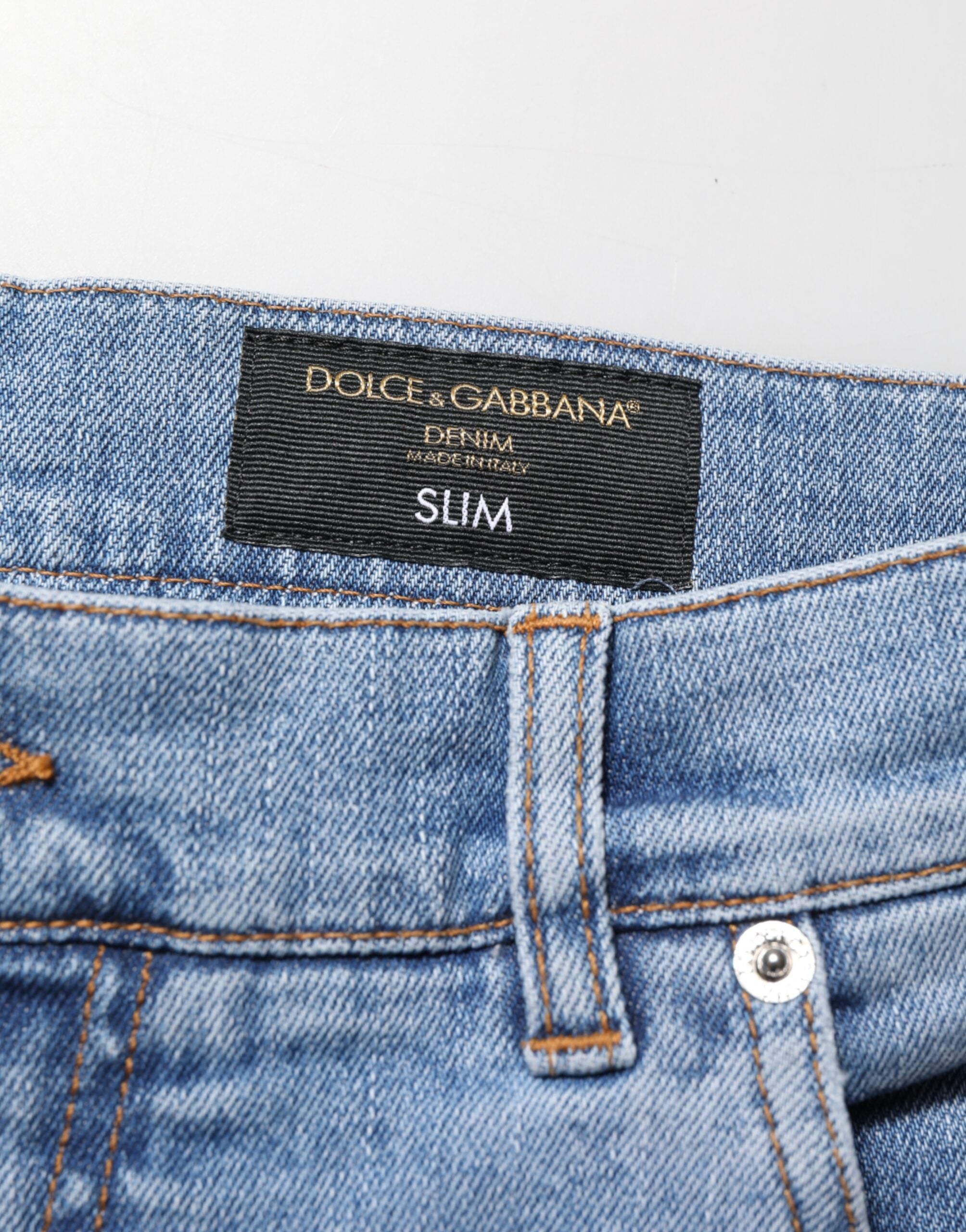 Dolce & Gabbana Blaue zerrissene Slim Fit Jeans aus Baumwolldenim