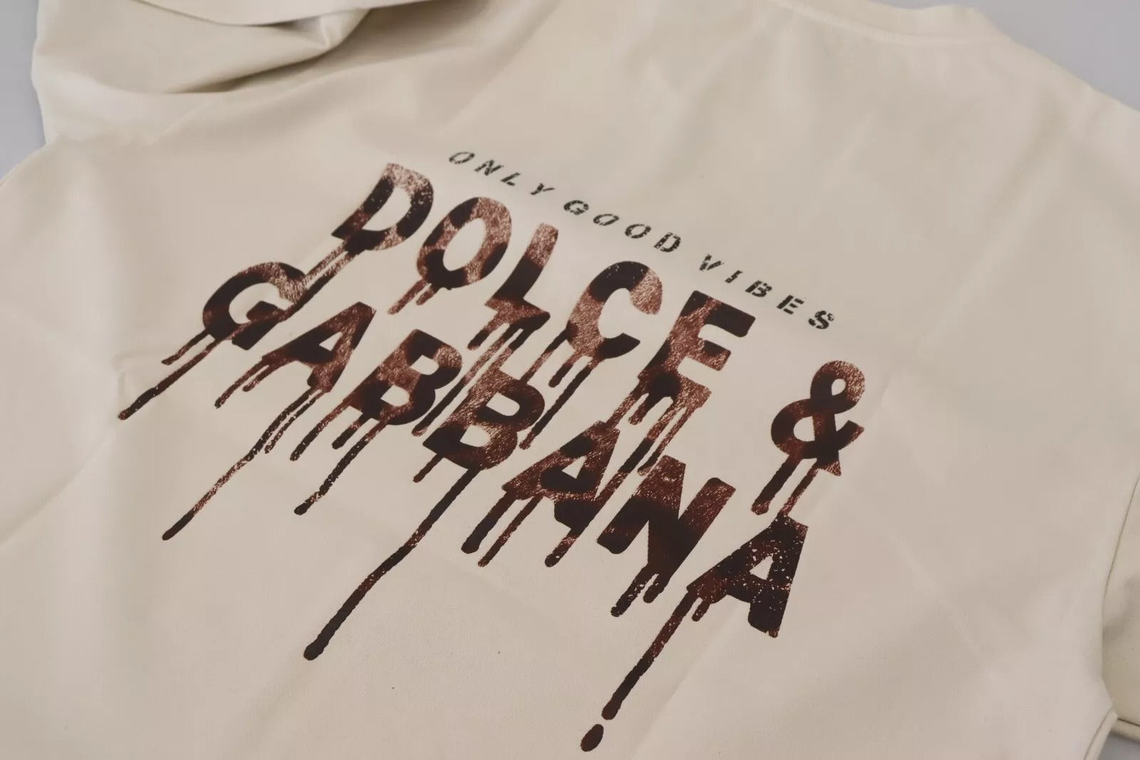 Dolce & Gabbana Elfenbeinfarbene Baumwolle Elfenbeinfarbener bedruckter Rundhalsausschnitt