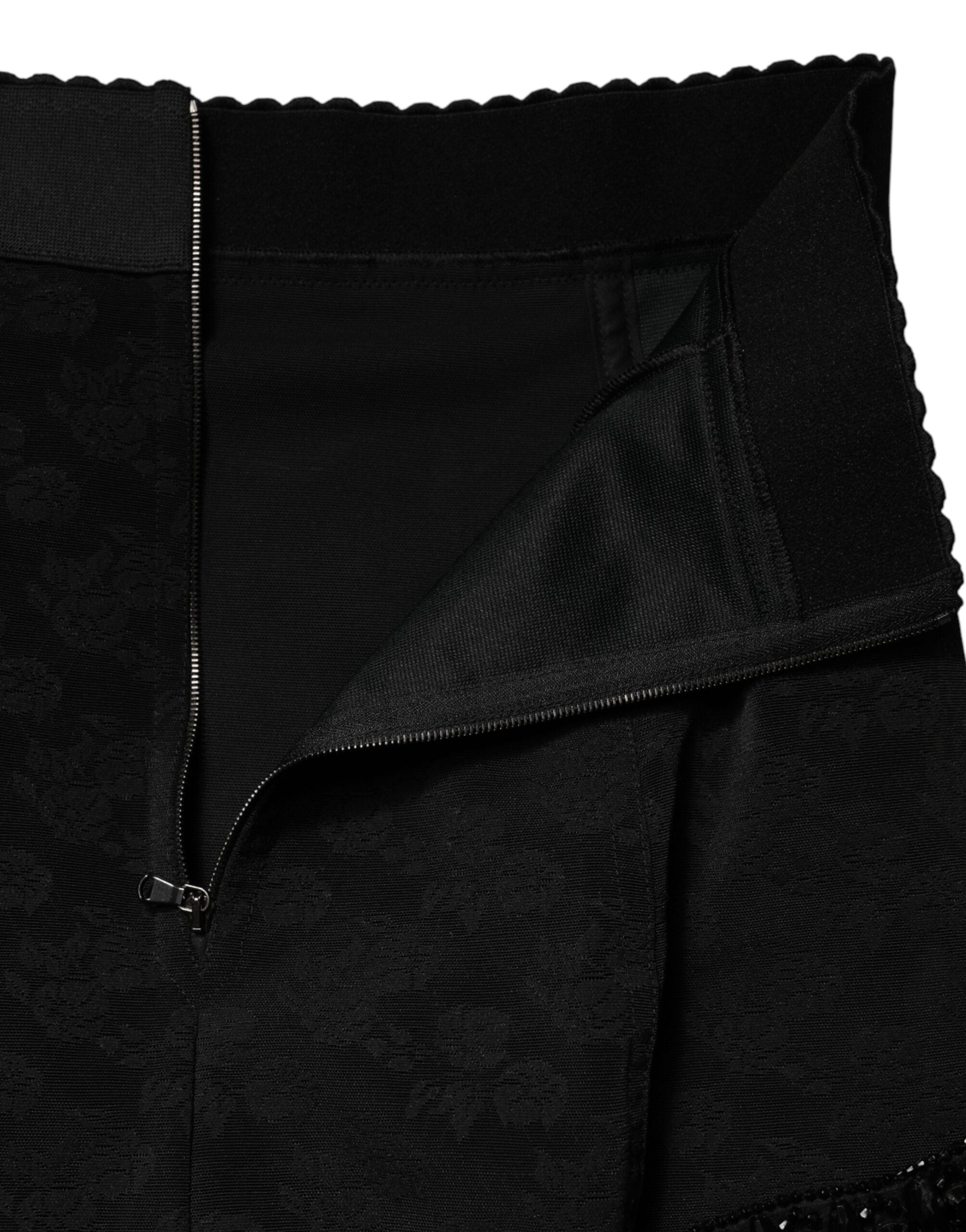 Dolce & Gabbana Schwarzer Nylon-Minirock mit Spitzenbesatz
