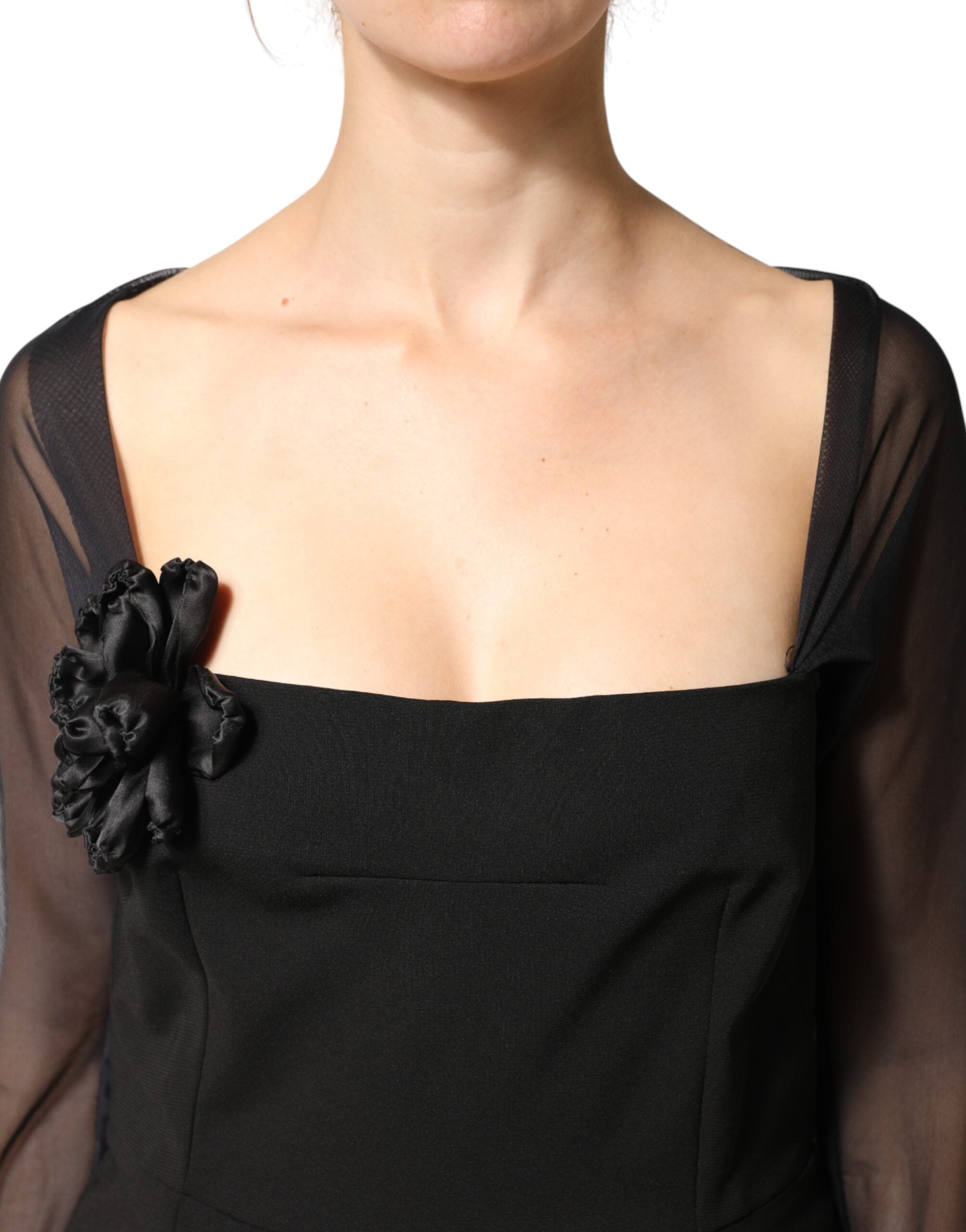 Dolce & Gabbana Schwarzes Etuikleid in Midi-Länge mit transparentem Einsatz und Rosetten-Applikation