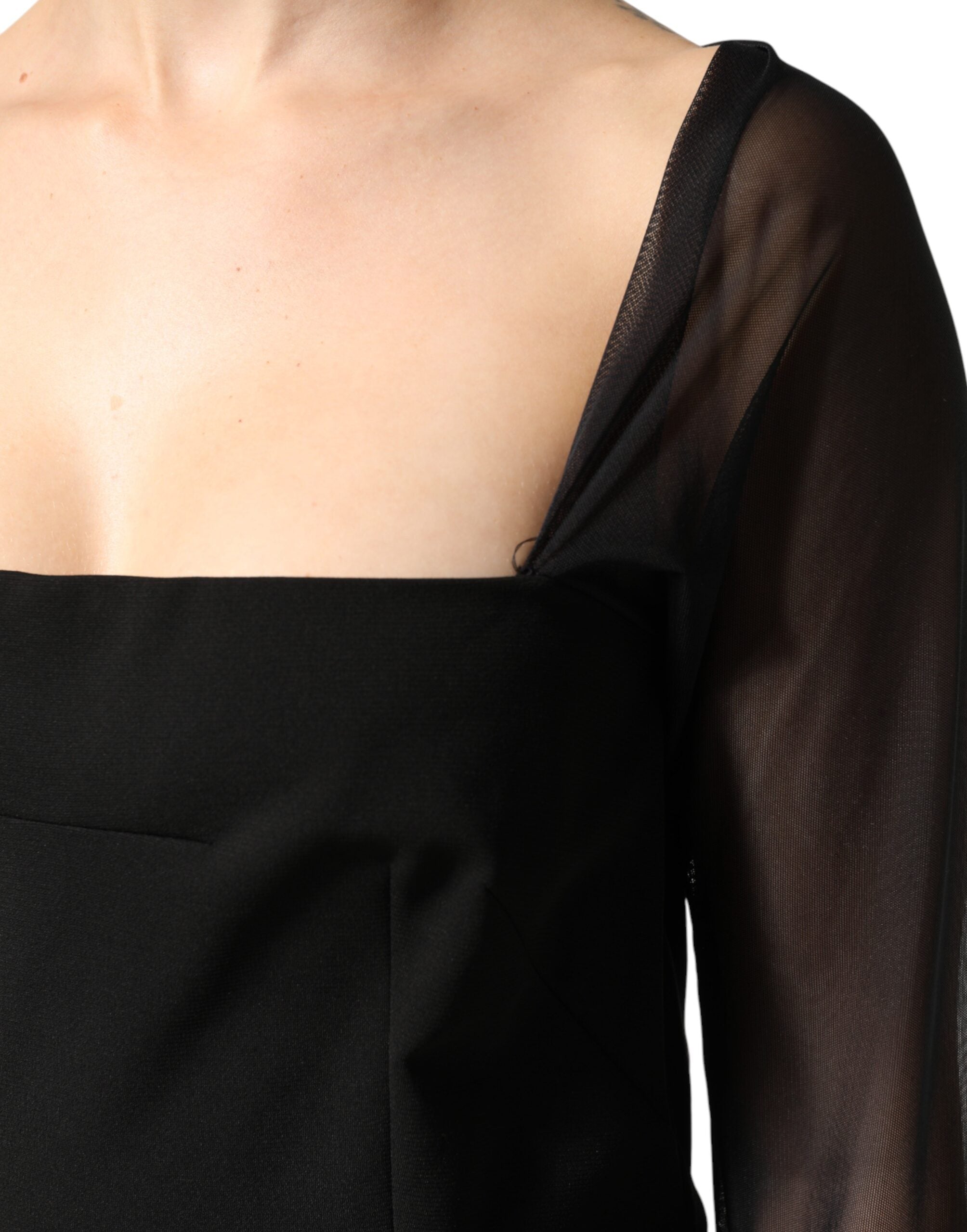 Dolce & Gabbana Schwarzes Etuikleid in Midi-Länge mit transparentem Einsatz und Rosetten-Applikation