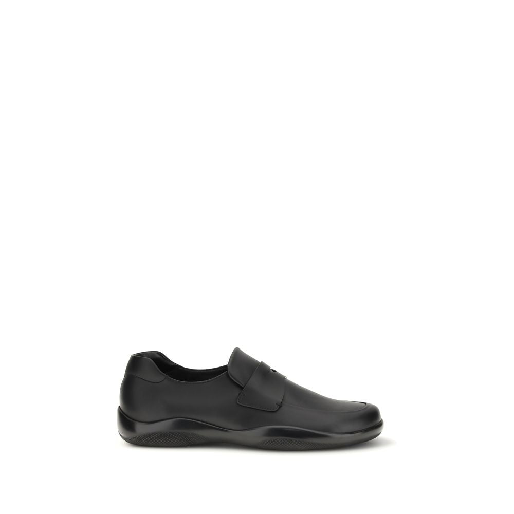 Prada Schwarze "Bos Taurus" Kalbsleder Loafer zum Hineinschlüpfen